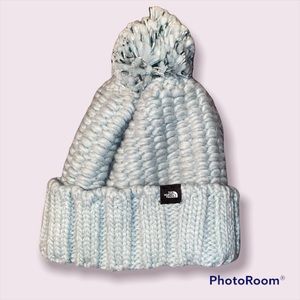 Light blue north face beanie with Pom